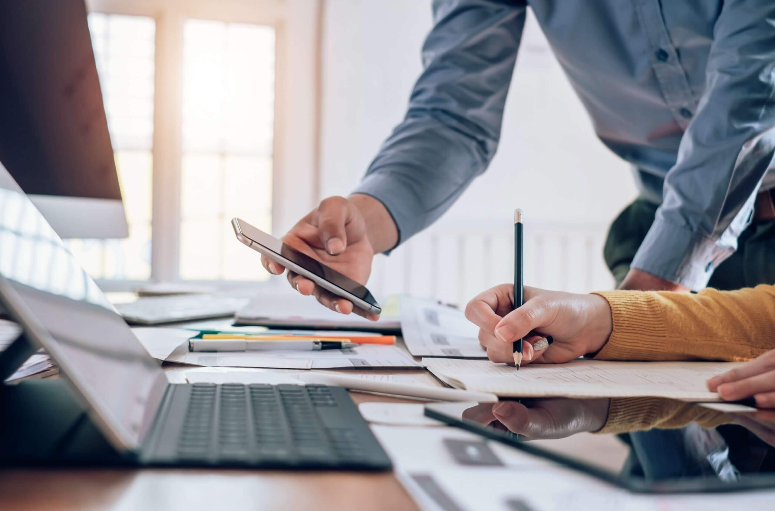 A workmate discussing something in her phone