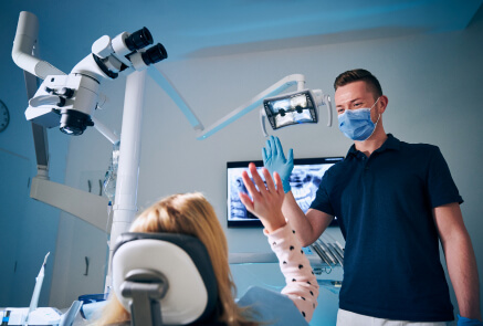 dentist giving his kid patient a high five