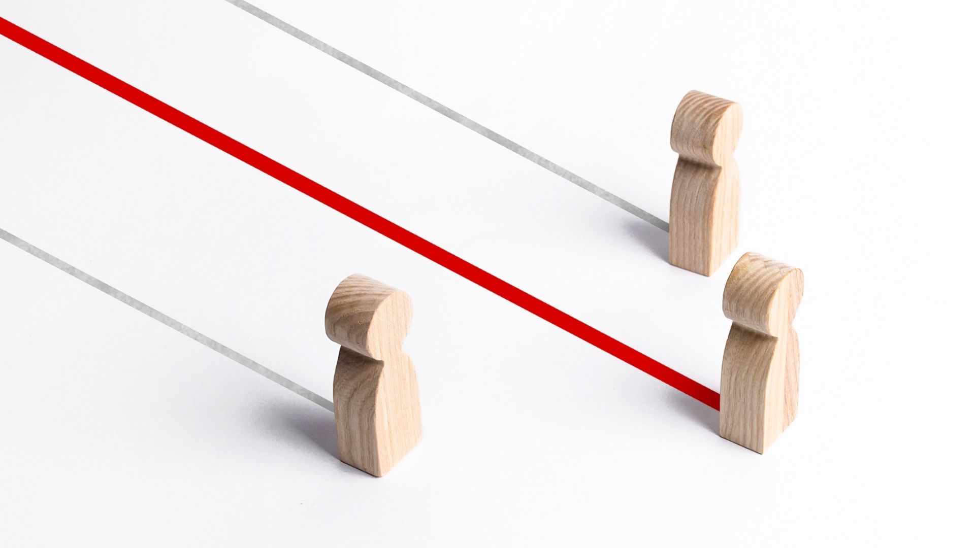 Figures of people racing and the leader is pulled forward