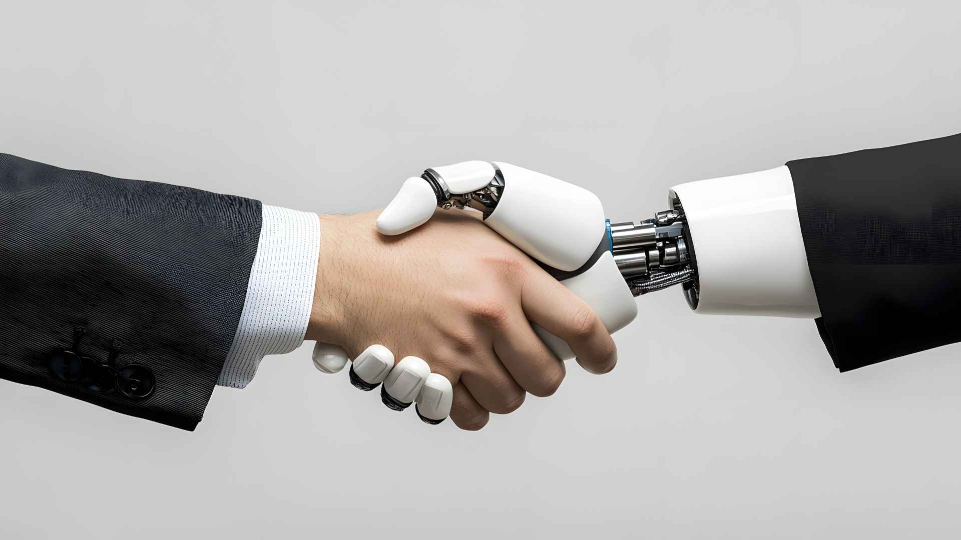 human and AI shaking hands