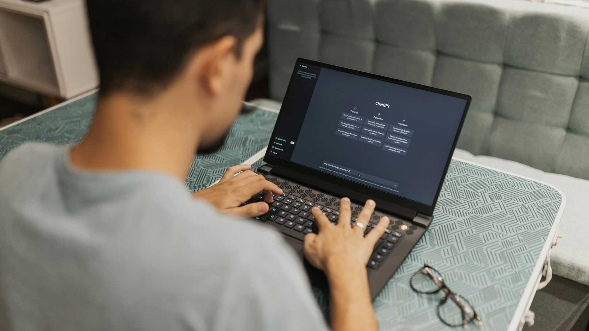 man working with chatGPT AI system