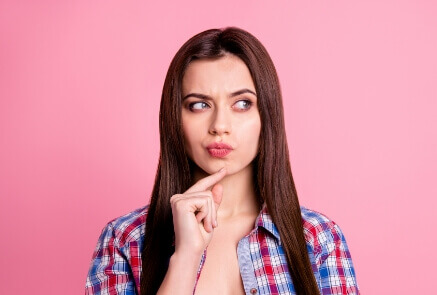 Confusing women in pink background