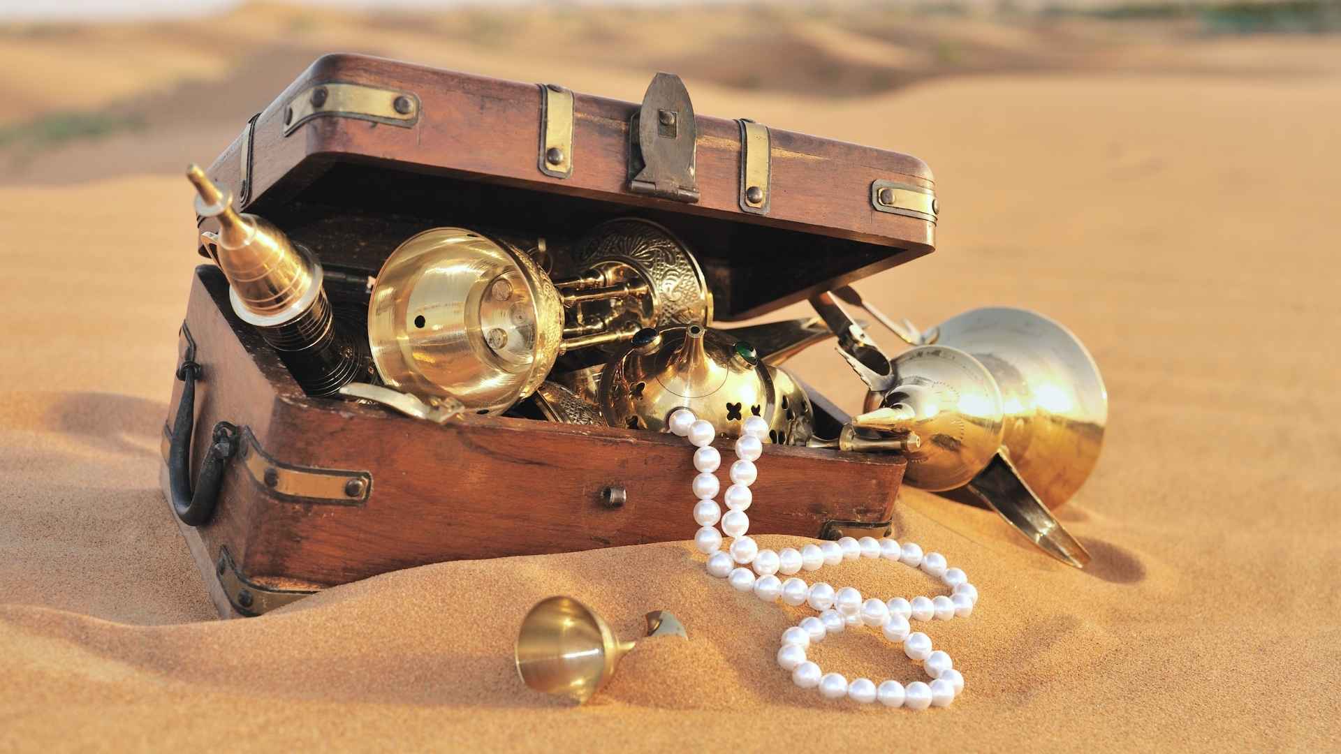 treasure chest sunken on the sand