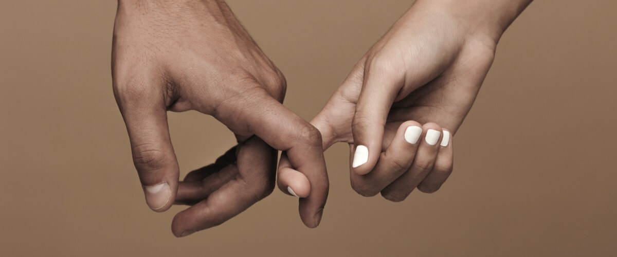 two hands linking together