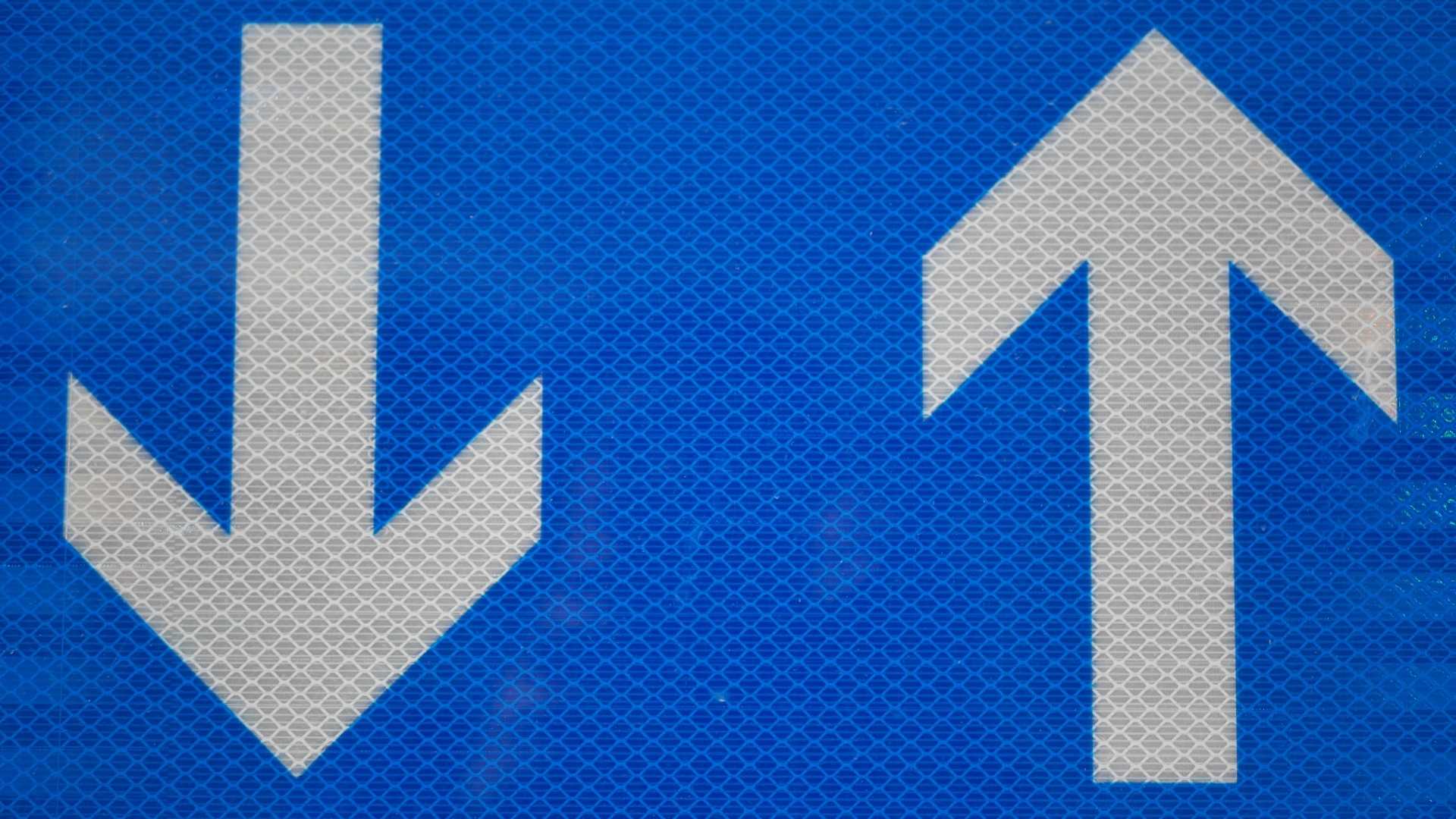up and down arrow in blue background