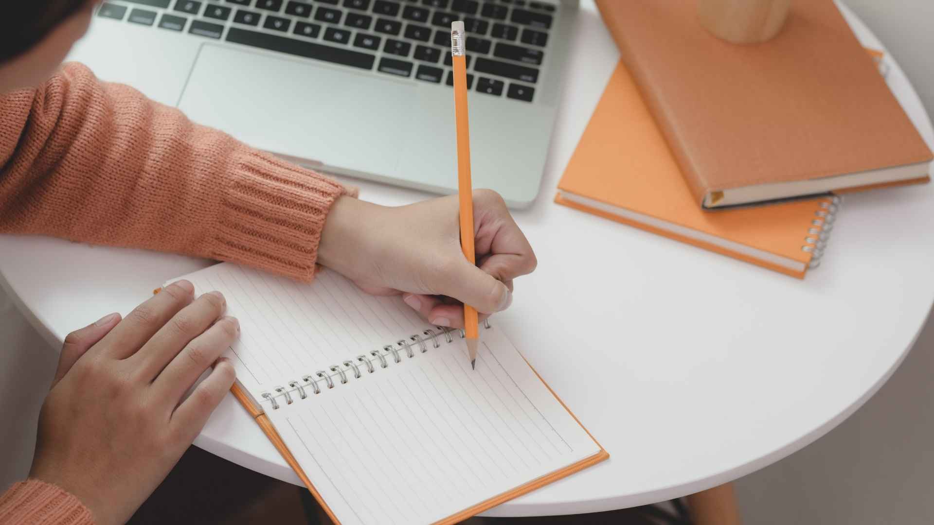 woman writing about her plans