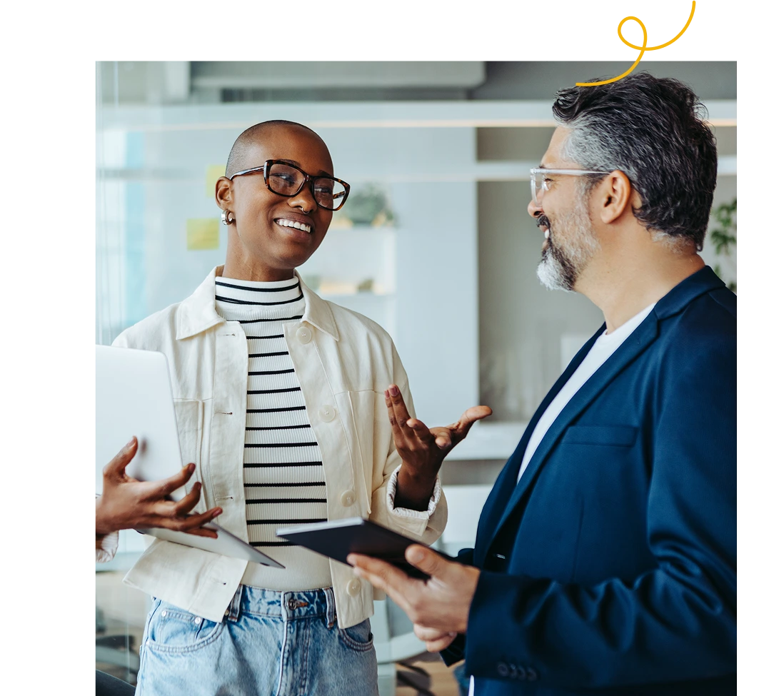 A man talking to his teammate